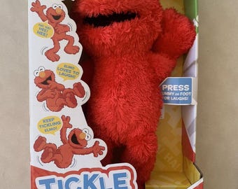 Official Playskool Friends Tickle Me Elmo ( age: 18 months - 4 years )