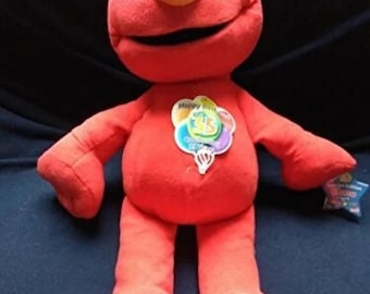 セサミストリート レアなヴィンテージ 楽しいエルモのぬいぐるみ 押す