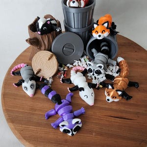Trash Animals Articulating Fidget Toy - Includes Trash Can/Tree Stump - Raccoon, Panda, Fox, Possum, Skunk - Collect Them All!! For All Ages