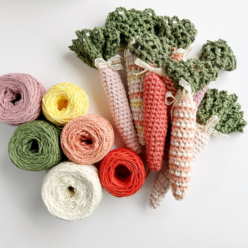 crochet carrots with green lacey tops in different colours for crochet carrot pattern