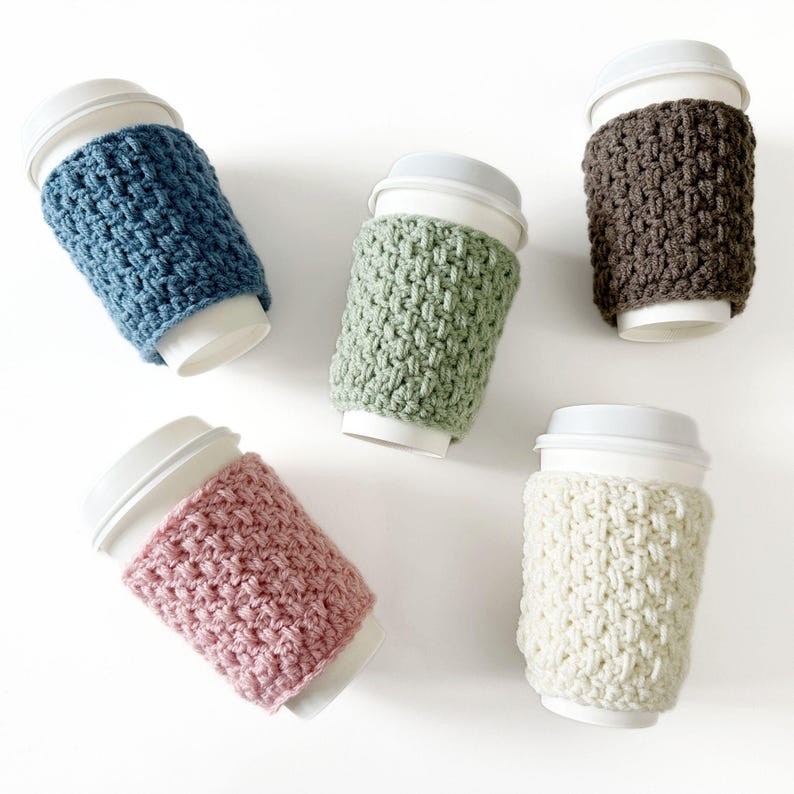 group of crochet cup cozies that look knit