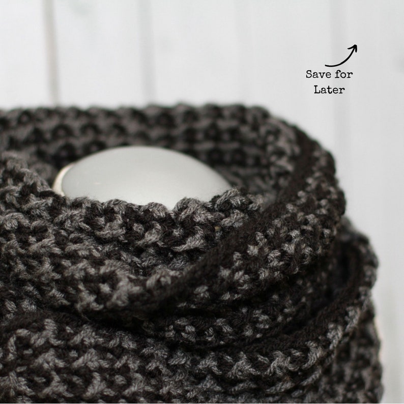 black and grey textured that looks like houndstooth crochet cowl