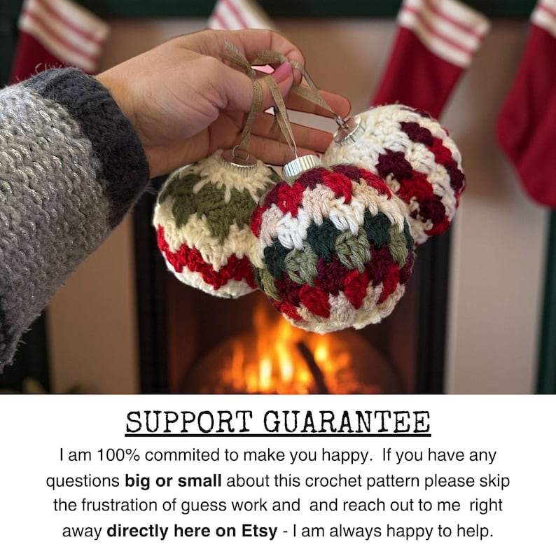 May include: Three handmade crochet Christmas ornaments in red, green, and white are held up against a fireplace. The ornaments have silver tops and are suspended by brown twine. The text at the bottom says "SUPPORT GUARANTEE".