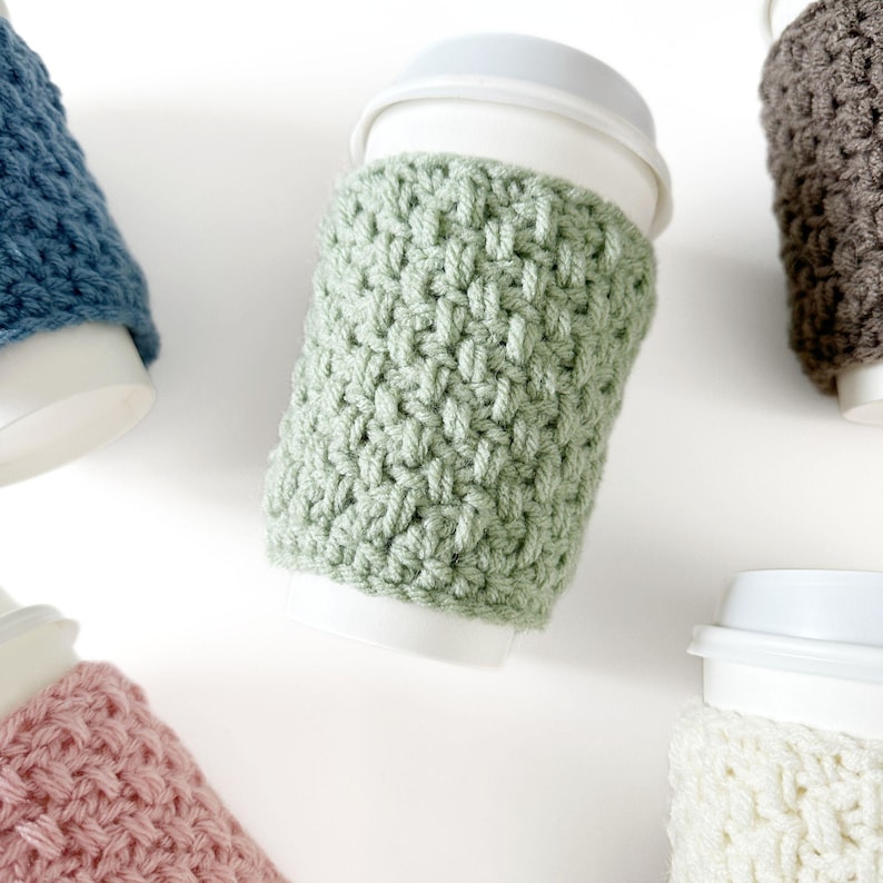 group of crochet cup cozies that look knit