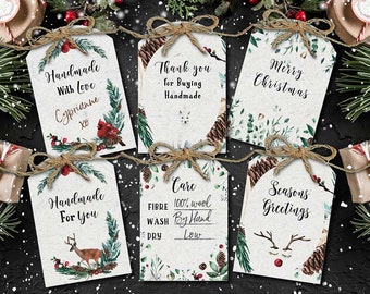 May include: Six white gift tags with a rustic, vintage look. The tags feature a variety of winter-themed illustrations, including pine cones, holly, and reindeer. The text on the tags includes "Handmade with Love", "Thank you for Buying Handmade", "Merry Christmas", "Handmade for you", "Care 100% wool, Wash by Hand, Dry Low", and "Seasons Greetings".