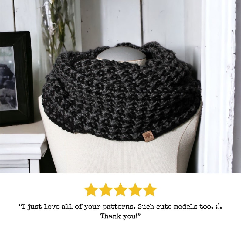 black and grey textured that looks like houndstooth crochet cowl on a dress form