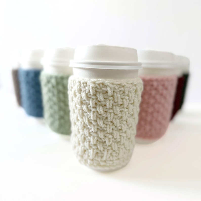 group of crochet cup cozies that look knit