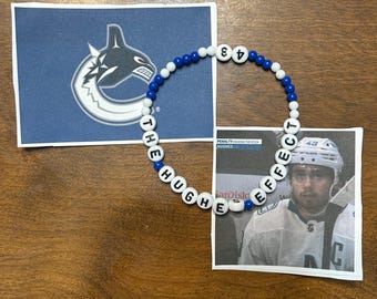 Quinn Hughes - El efecto Hughes - Pulsera