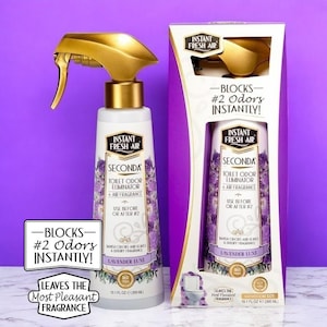 May include: A white and gold spray bottle of Secunda toilet odour eliminator with a lavender scent. The product is displayed with its packaging, which includes the text "Blocks #2 Odours Instantly!" and "Leaves the Most Pleasant Fragrance."