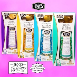 May include: Four boxes of Instant Fresh Air toilet odor eliminator in various scents. Each box features a different colour scheme and the text "BLOCKS #2 Odors INSTANTLY!". The product is labeled "SECONDA TOILET ODOR ELIMINATOR AIR FRAGRANCE".
