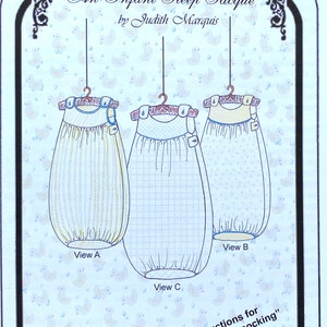 May include: A sewing pattern for a baby sleep sack called "Lullaby" by Judith Marquis. The pattern includes three different views of the sleep sack, with instructions for "dot-free, pleater-free smocking". The pattern is available in sizes 5lb., 9lb., 14lb., 20lb., and 26lb.