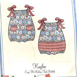 May include: A sewing pattern for a baby's romper with a floral print and pink ribbon ties. The pattern is called "Kaylee Easy Fit Ribbon Tied Bubble" and is from Bonnie Blue Designs. The pattern includes sizes 6, 12, 18, and 24 months, as well as 3 and 4 years.