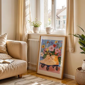 May include: A framed print of a colourful floral arrangement with a pair of yellow roller skates in the centre. The print is hanging on a wall in a living room setting.