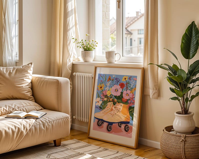 May include: A framed print of a colourful floral arrangement with a pair of yellow roller skates in the centre. The print is hanging on a wall in a living room setting.