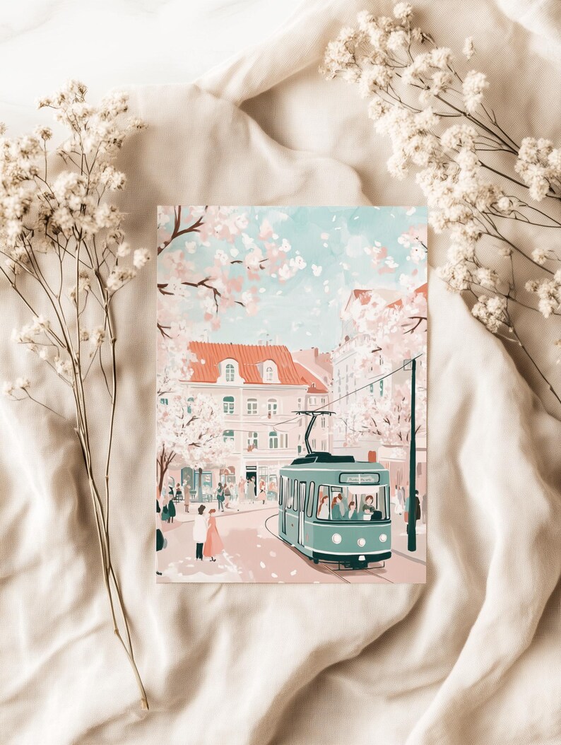 May include: A vintage-style green tram travels down a street lined with buildings and cherry blossom trees. The scene is painted in a soft, pastel color palette.