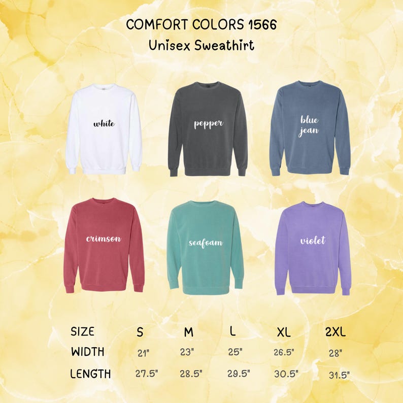 以下が含まれることがあります： 白、ペッパー、ブルージーンズ、クリムゾン、シーフォーム、バイオレットのComfort Colors 1566ユニセックススウェットシャツのディスプレイ。 サイズの詳細が含まれており、幅は53.3cmから71.1cm、長さは69.9cmから80cmです。