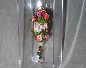 Miniature Hanging ornament inside an acrylic box