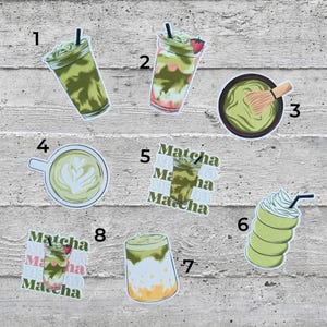 May include: A collection of eight matcha-themed stickers. The stickers depict matcha drinks, a latte, and a bowl of matcha with a whisk. Some stickers include the word "Matcha". The color palette is primarily green and white.