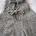 Shontay Butler reviewed Child Poncho Knitted Sizes 1 - 3 month, 6-9 months, Size 2 and 3/4 Hood Soft Chunky Yarn Grey Red Pink Purple Green Blue