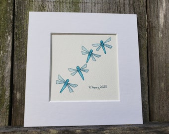 Hand Drawn Abstract Teal Dragonflies on Watercolor Paper