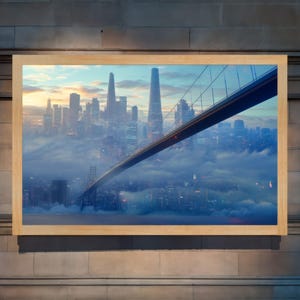 May include: A photograph of a city skyline with a bridge extending over the city. The city is covered in fog and the bridge is reflected in the fog. The sky is a light blue with clouds.