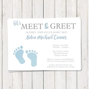 May include: A baby shower invitation with blue footprints and the text "let's MEET & GREET Audrey and Kyle's Baby Boy Aiden Michael Connor" and details about the event.