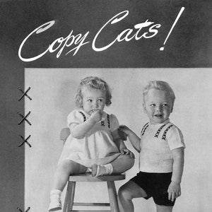 May include: A black and white photograph of two children wearing knitted clothing. The girl is sitting on a wooden stool and the boy is standing next to her. The photo is captioned "Copy Cats!" and includes a Botany Brand Silhouette label.