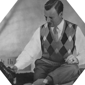 May include: A black and white photo of a man wearing a diamond patterned sweater vest, a white shirt with a tie, and socks with a diamond pattern. The text "The Perfect Mate..." is at the bottom of the image.