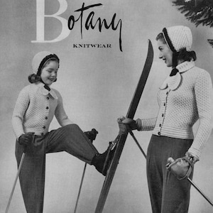 May include: Two people wearing white knit sweaters and matching hats are skiing in the snow. The woman is holding ski poles and the girl is holding one ski pole. The text "Botany Knitwear" is printed on the image.