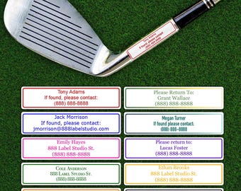 Könnte beinhalten: Ein Golfschläger mit silbernem Kopf und schwarzem Griff, auf grünem Gras. Darunter befinden sich rechteckige Etiketten mit Namen und Kontaktdaten, darunter "Tony Adams" und "Jack Morrison".