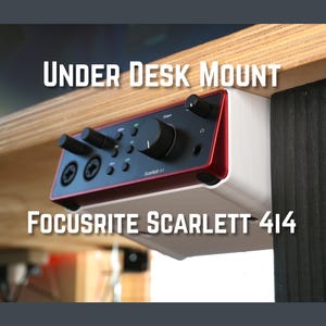 May include: A set of three ceramic mugs with a speckled, matte finish. The mugs are in shades of cream, light gray, and dark gray. Each mug has a simple, minimalist design, perfect for coffee or tea.