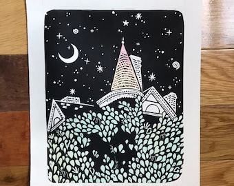May include: A black and white linocut print of a house with a pink and white spire under a starry night sky. The house is surrounded by green foliage. The print is titled "Reflections of Past Dreams" and signed "Nicole Stockton".