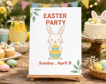 Può includere: Un cartello per una festa di Pasqua su un cavalletto di legno. Il cartello presenta un coniglietto dei cartoni animati che tiene un uovo di Pasqua, con le parole "Easter Party" e "Sunday, April 9". La scena comprende cupcakes, una torta e uova di Pasqua.