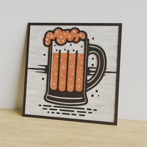 May include: A wooden wall sign with a black frame features a stylized illustration of a beer mug with a foamy head. The mug is filled with a light orange liquid and has a black handle.