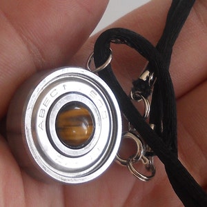 Roller Derby Skate Bearing Necklace, inlayed with tiger eye,  made from an upcyced roller derby bearing