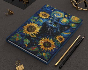 May include: A hardcover journal with a vibrant painting of a black cat surrounded by sunflowers and a starry night sky. The journal has a blue cover and is lying on a dark gray surface.