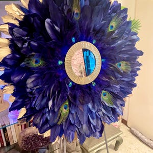 Feather Mirror, Juju Hat chic, navy blue, gold, with a gold metal mirror, made of peacock feathers, goose feathers and rooster feathers