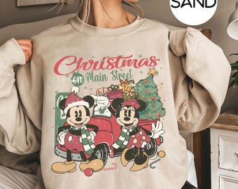 vintage Disney Noël sur la rue principale sweat-shirt Mickey Minnie Fête de Noël très joyeux 2025 t-shirt Disney Noël voyage voyage t-shirt Mickey