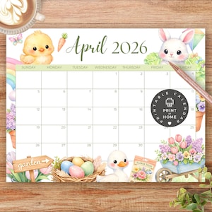 May include: A colorful April 2026 calendar with a spring theme. Features a cute chick, bunny, and duck illustrations. Includes a rainbow, eggs, flowers, and the text "Print at Home". The calendar is on a wooden surface.
