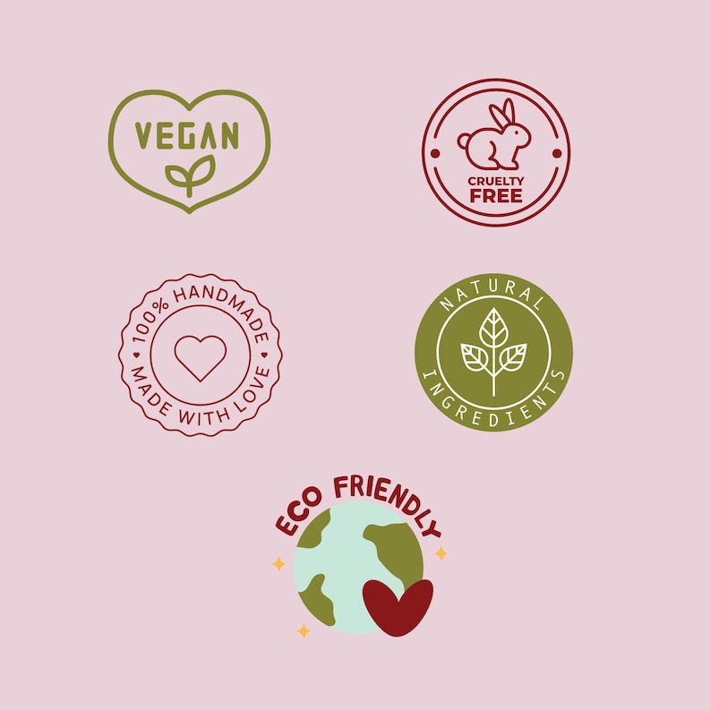 May include: Five circular and heart-shaped icons featuring text and graphics: a green heart labeled VEGAN, a red rabbit icon labeled CRUELTY FREE, a red seal stating 100% HANDMADE MADE WITH LOVE, a green circle labeled NATURAL INGREDIENTS, and an ECO FRIENDLY globe.