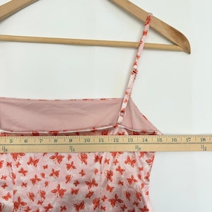 Années 2000 Vtg Urban Outfitters UO - Mini-robe sans lacet papillon rose en satin brillant image 4