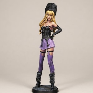 May include: Figurine of a woman with blonde hair, wearing a black fur hat, corset, and boots. She is also wearing a purple pleated skirt, purple thigh-high stockings, and black gloves. The figurine stands on a black base.