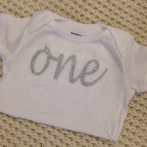 Silver Glitter Iron-On vinyl cursive &quot;one&quot; lettering for yearly, monthly, or birthday onesie- IRON ON ONLY