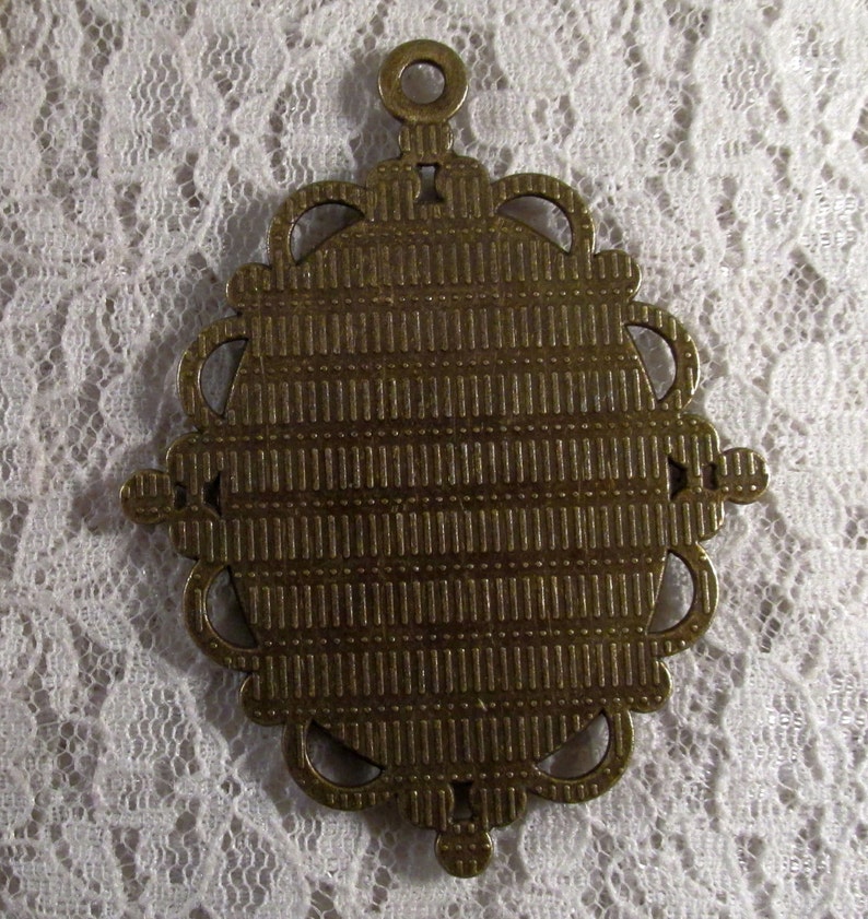 R9 Belle I 1pc : sku 09.02.14.5 Antique Bronze Setting 40x30mm