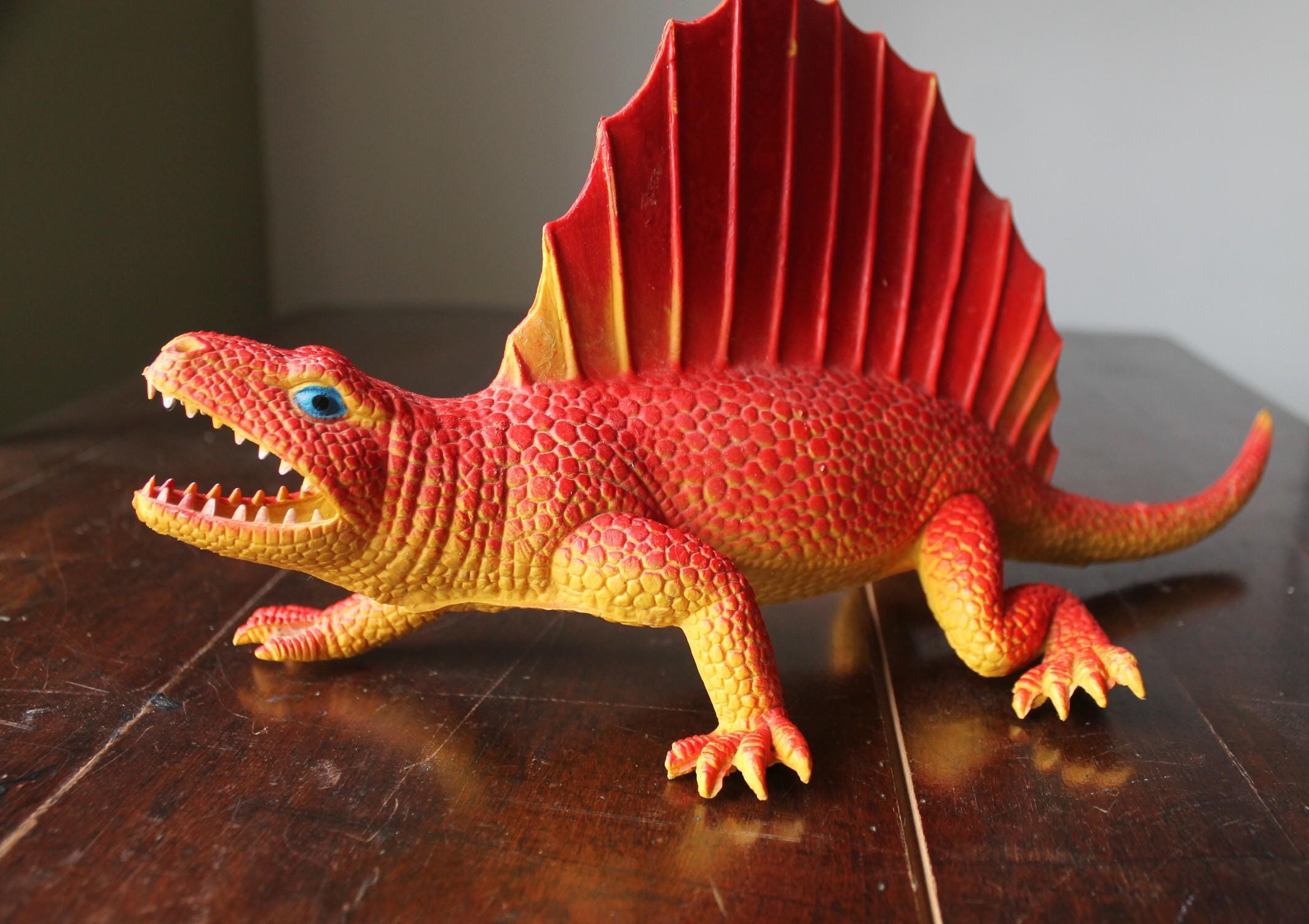 Vintage 1980s Dor Mei Edaphosaurus Dinosaur Figurine: Red & Yellow
