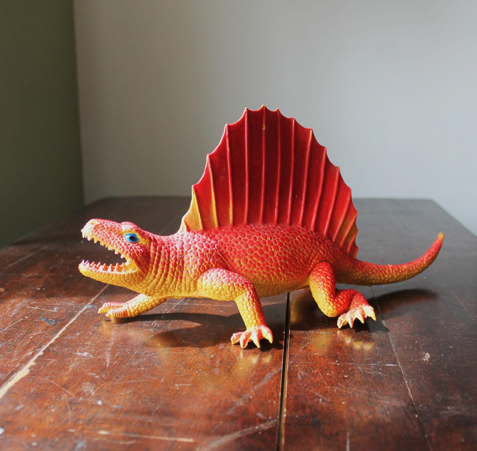 Vintage 1980s Dor Mei Edaphosaurus Dinosaur Figurine: Red & Yellow