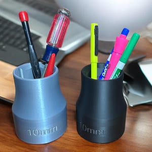 Organize your workspace in style with this unique 10mm socket desk organizer. Keep your pens, pencils, and other essentials neatly stored.