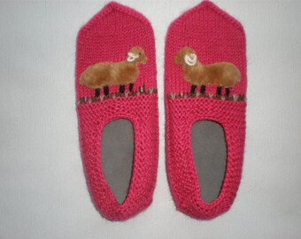 Hand-knitted women pink slippers with sheep