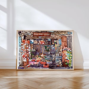 May include: Watercolor painting of a store with the text "Sari Sari Store" on a sign. The artwork features a variety of colorful products and a wooden frame. The painting is displayed on a wall with a wooden floor.