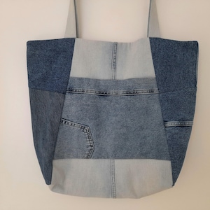 Eco friendly upcycled modern patchwork denim tote bag, sustainable fashion denim jeans bag, timeless roomy denim shoulder bag with pockets